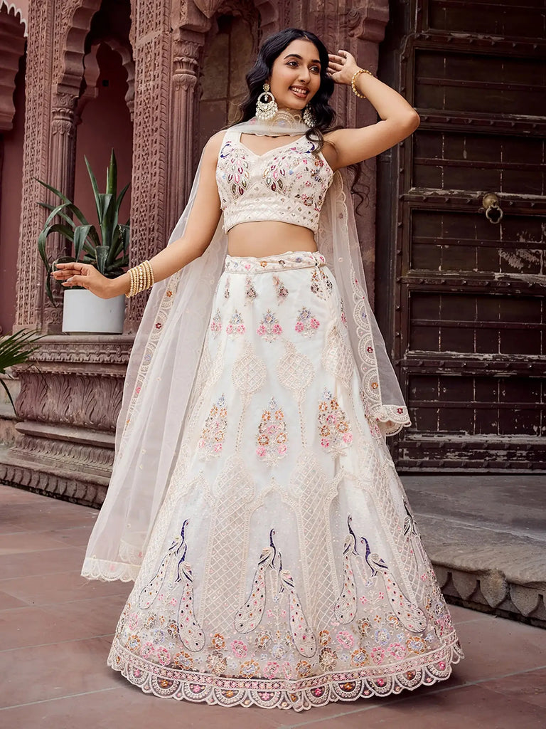 Stunning Cream Sequins Embroidered Net Wedding Wear Lehenga Choli