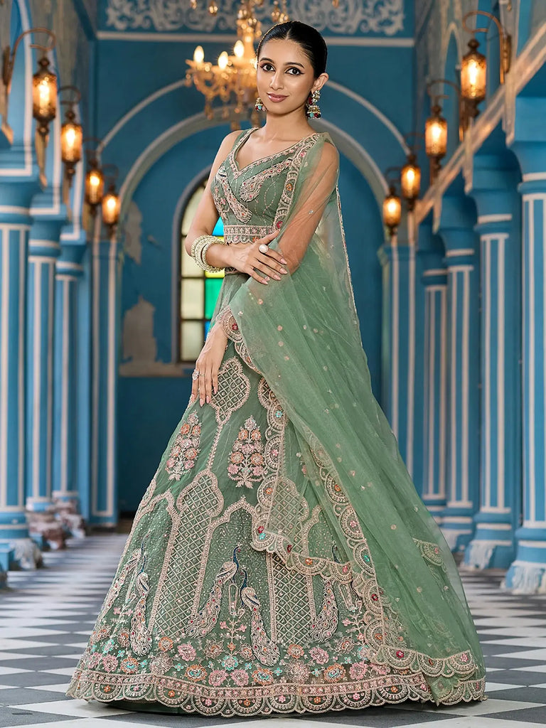 Attractive Green Thread Embroidered Net Engagement Wear Lehenga Choli