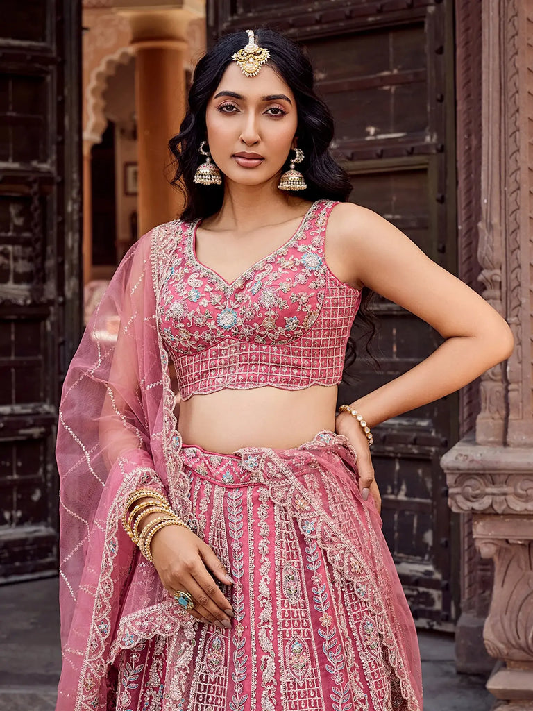 Glowing Rose Gold Sequins Embroidered Net Engagement Lehenga Choli