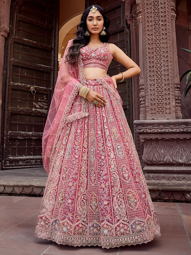 Glowing Rose Gold Sequins Embroidered Net Engagement Lehenga Choli