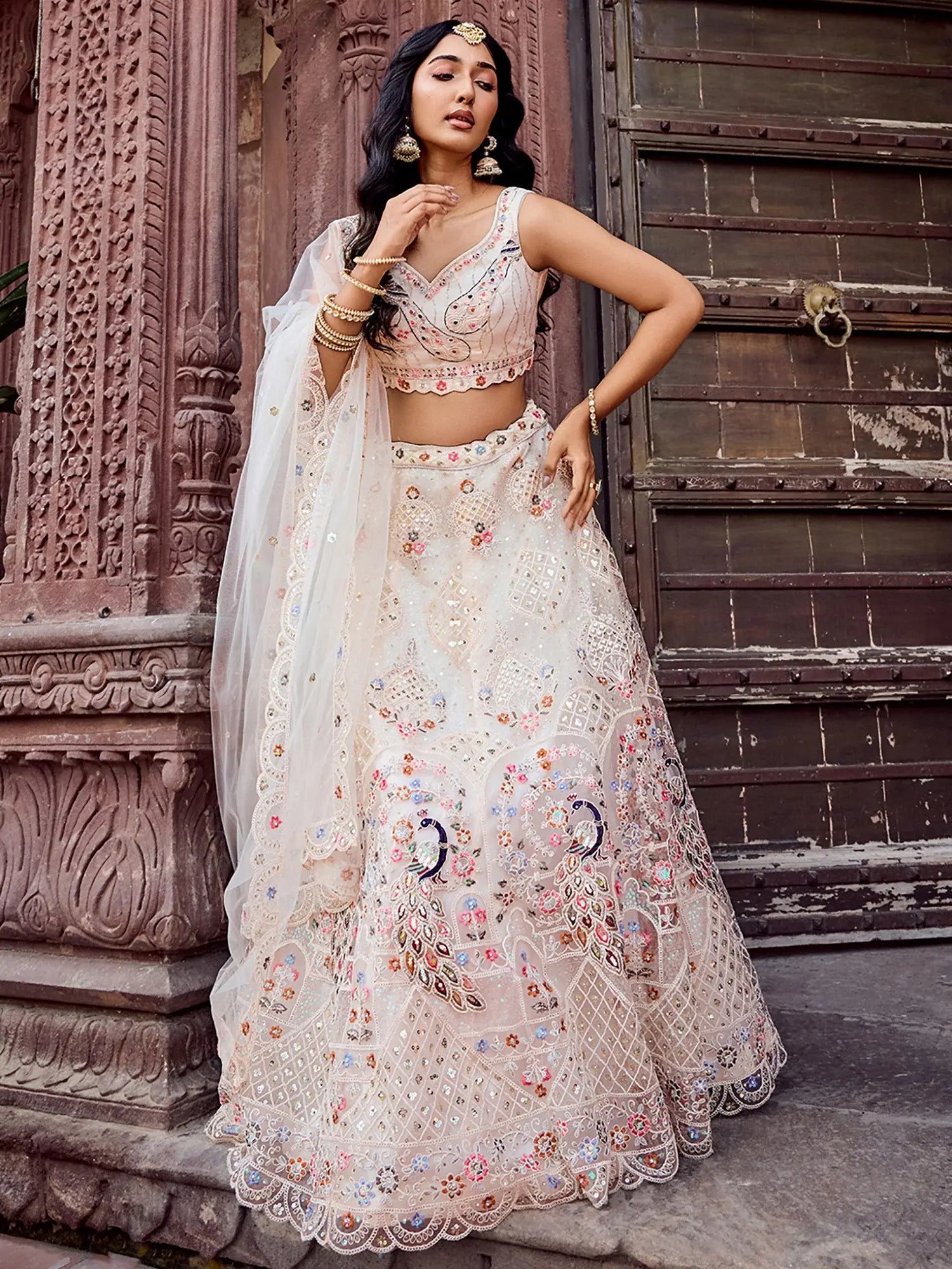 Adorable Cream Sequins Embroidered Net Bridesmaid Lehenga Choli