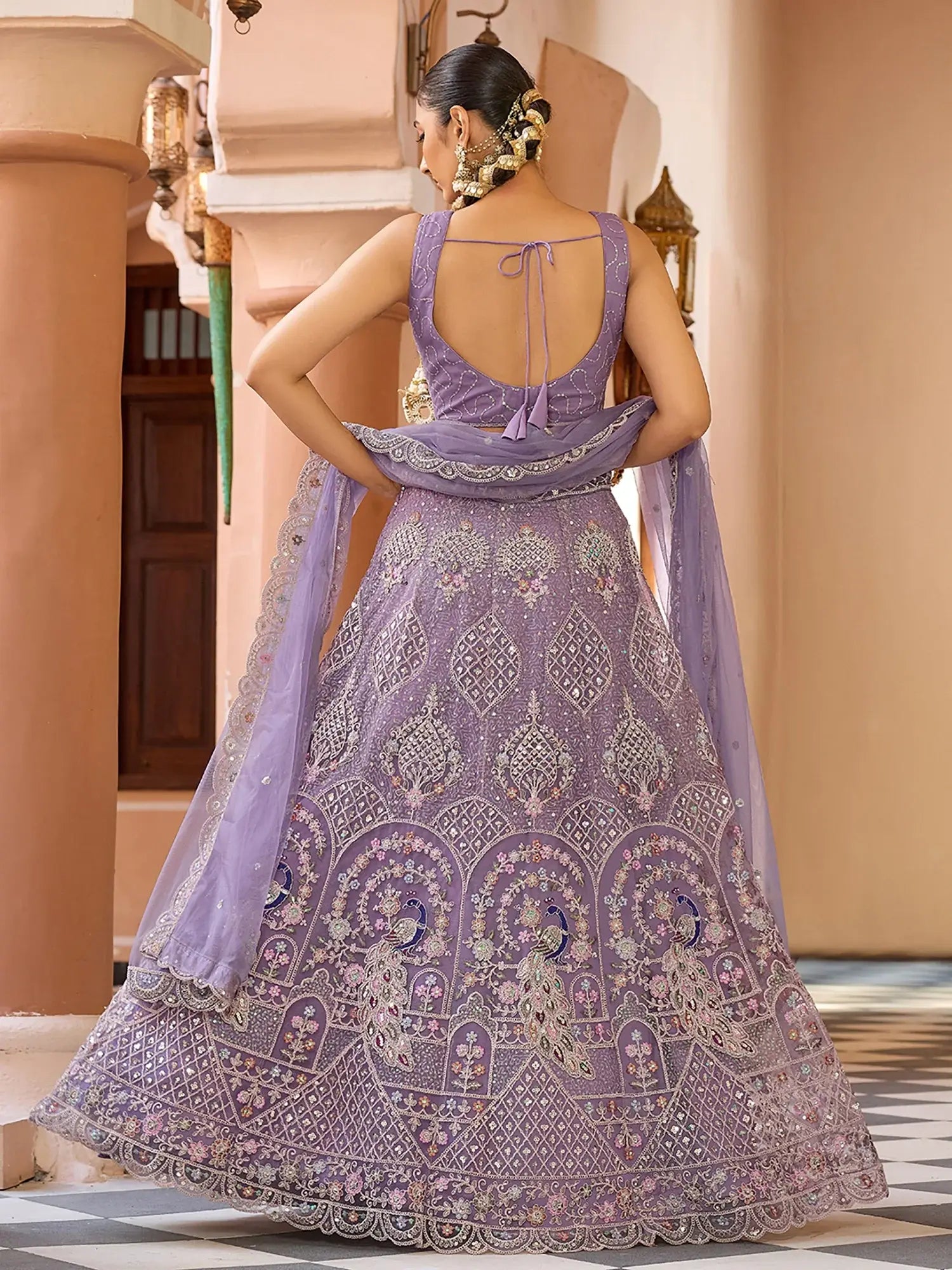 Dazzling Purple Sequins Embroidered Net Wedding Wear Lehenga Choli