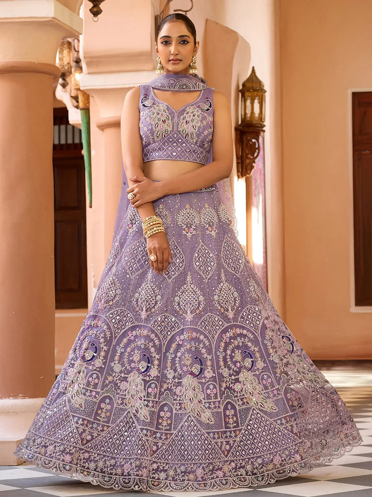 Dazzling Purple Sequins Embroidered Net Wedding Wear Lehenga Choli