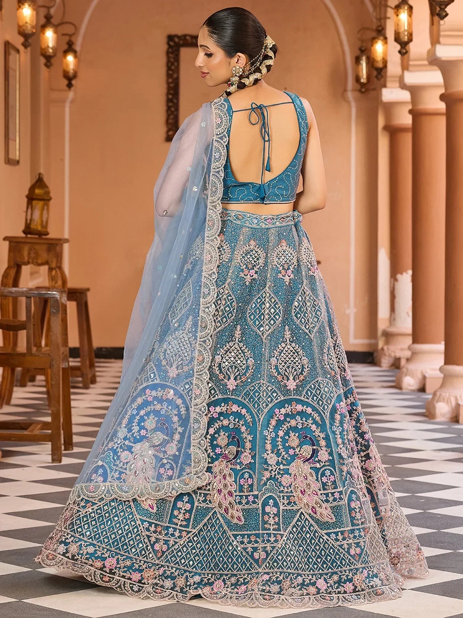 Charming Blue Thread Embroidered Net Engagement Wear Lehenga Choli