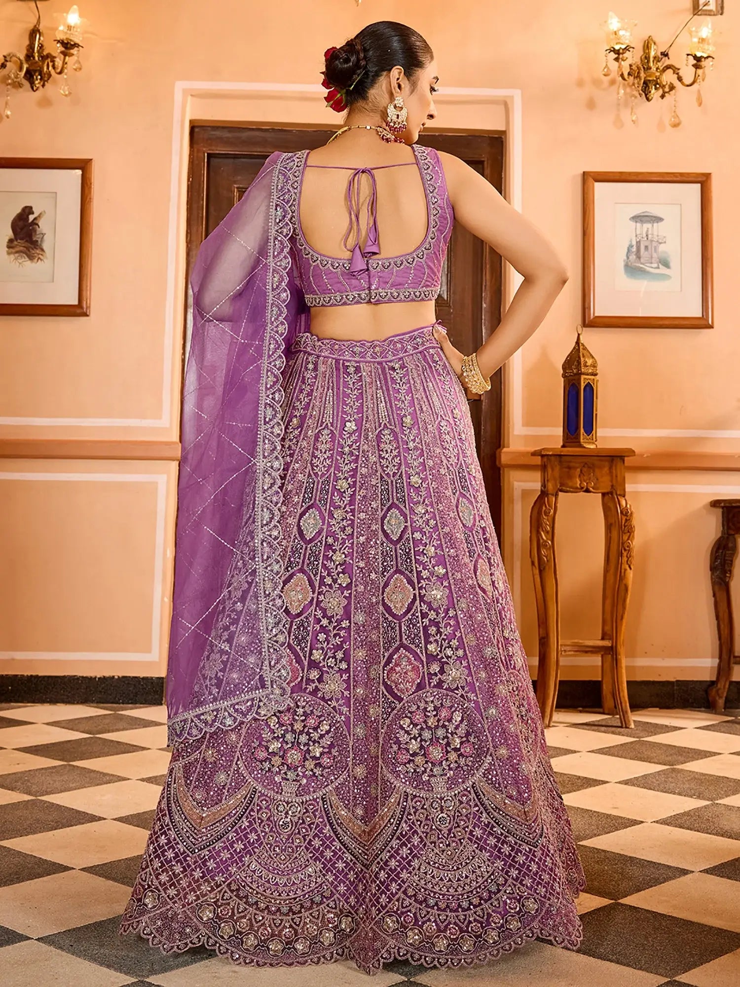 Glamorous Lavender Thread Embroidered Net Engagement Lehenga Choli