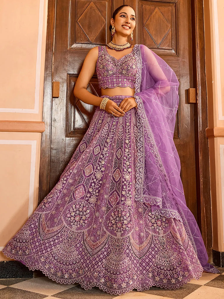 Glamorous Lavender Thread Embroidered Net Engagement Lehenga Choli