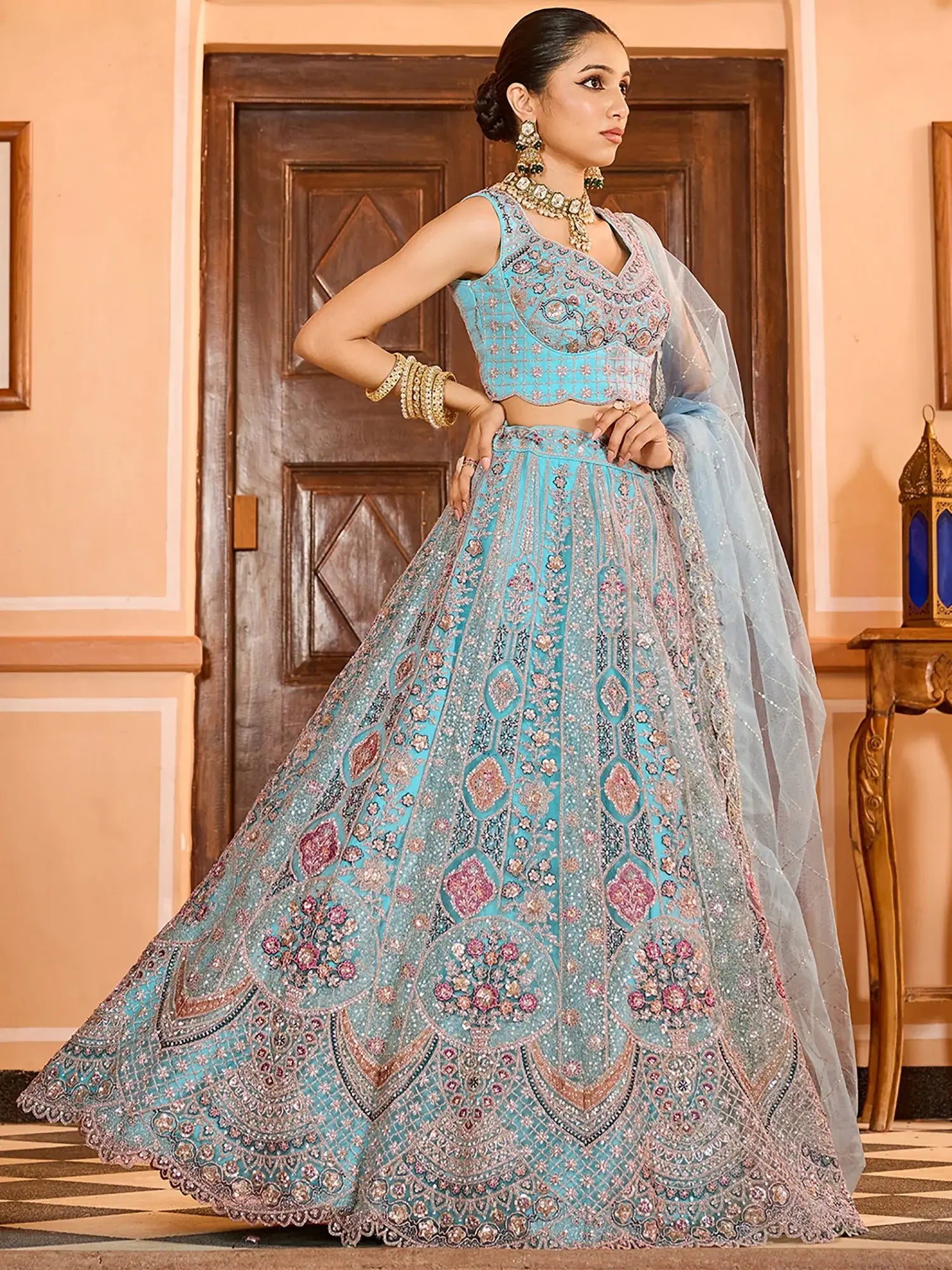 Elegant Blue Sequins Embroidered Net Wedding Wear Lehenga Choli