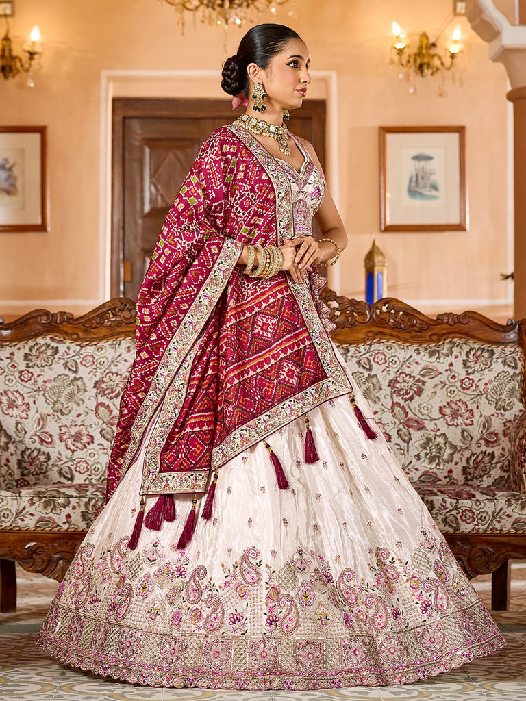 Charming Cream Embroidered Tissue Wedding Wear Lehenga Choli