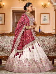 Charming Cream Embroidered Tissue Wedding Wear Lehenga Choli