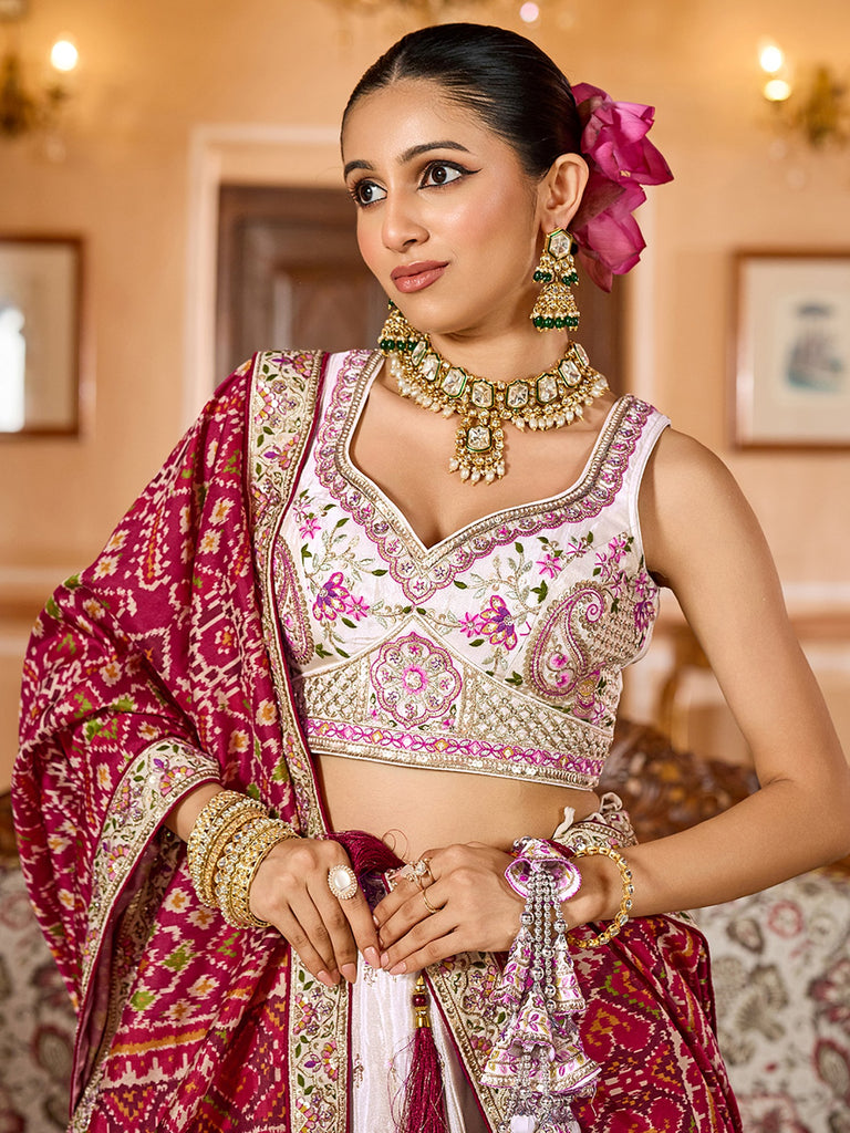 Charming Cream Embroidered Tissue Wedding Wear Lehenga Choli