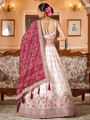 Charming Cream Embroidered Tissue Wedding Wear Lehenga Choli