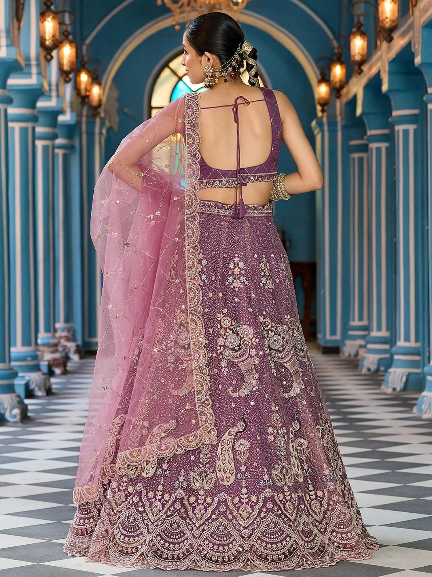 Pretty Lavender Embroidered Net Reception Wear Lehenga Choli
