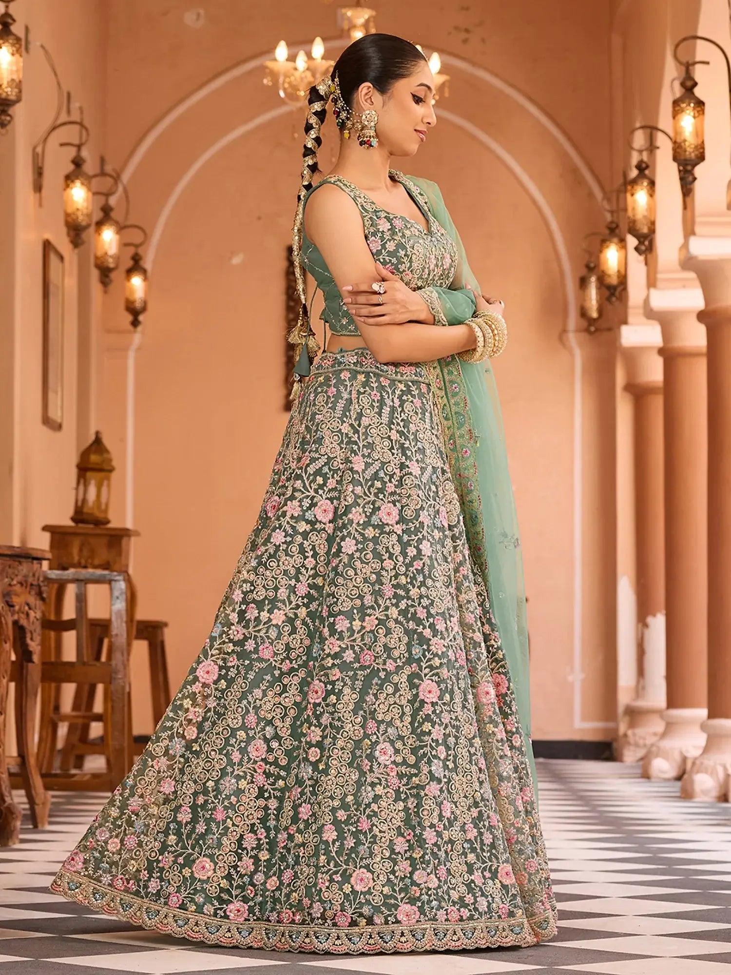 Stunning Pista Sequins Embroidered Net Reception Wear Lehenga Choli