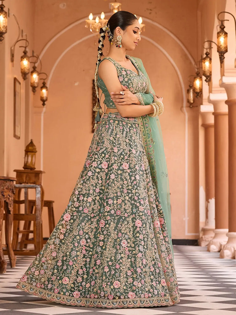 Stunning Pista Sequins Embroidered Net Reception Wear Lehenga Choli