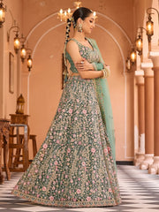 Stunning Pista Sequins Embroidered Net Reception Wear Lehenga Choli