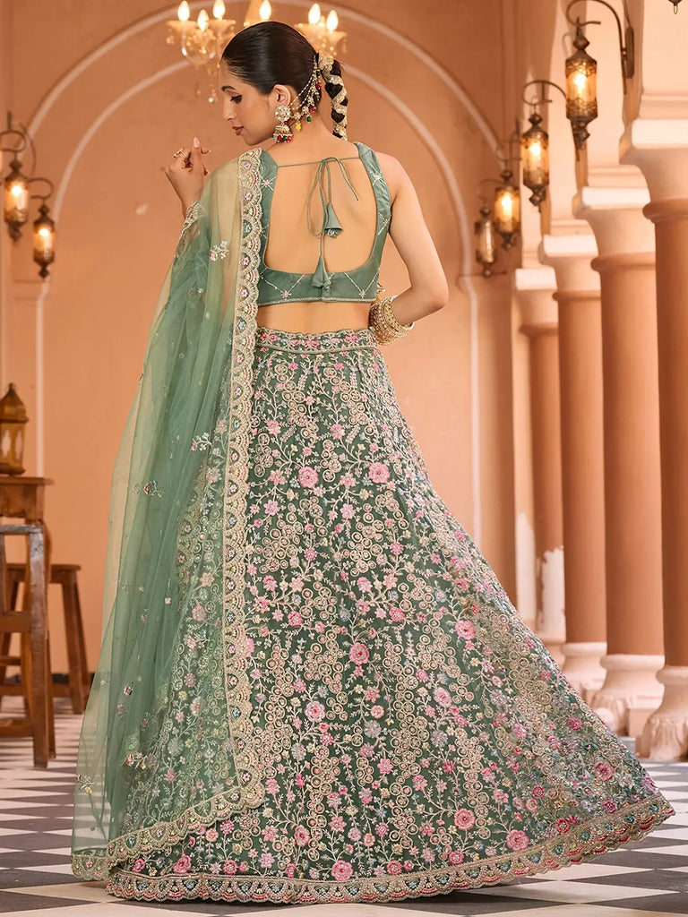 Stunning Pista Sequins Embroidered Net Reception Wear Lehenga Choli