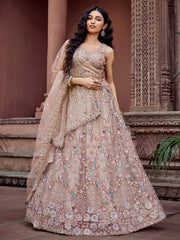 Elegant Beige Sequins Embroidered Net Engagement Wear Lehenga Choli
