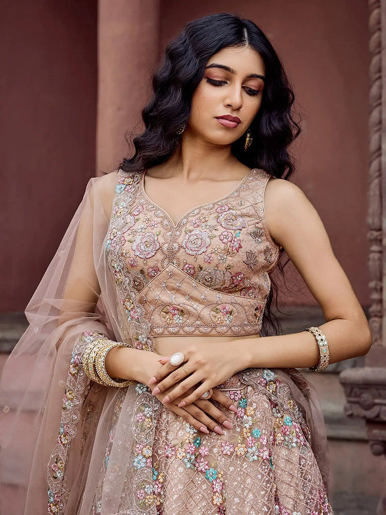 Elegant Beige Sequins Embroidered Net Engagement Wear Lehenga Choli
