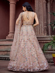 Elegant Beige Sequins Embroidered Net Engagement Wear Lehenga Choli