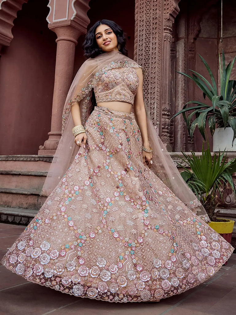 Elegant Beige Sequins Embroidered Net Engagement Wear Lehenga Choli