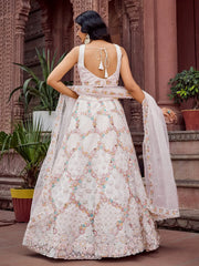 Captivating Cream Sequins Embroidered Net Wedding Wear Lehenga Choli