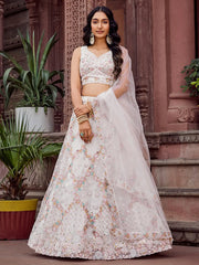 Captivating Cream Sequins Embroidered Net Wedding Wear Lehenga Choli