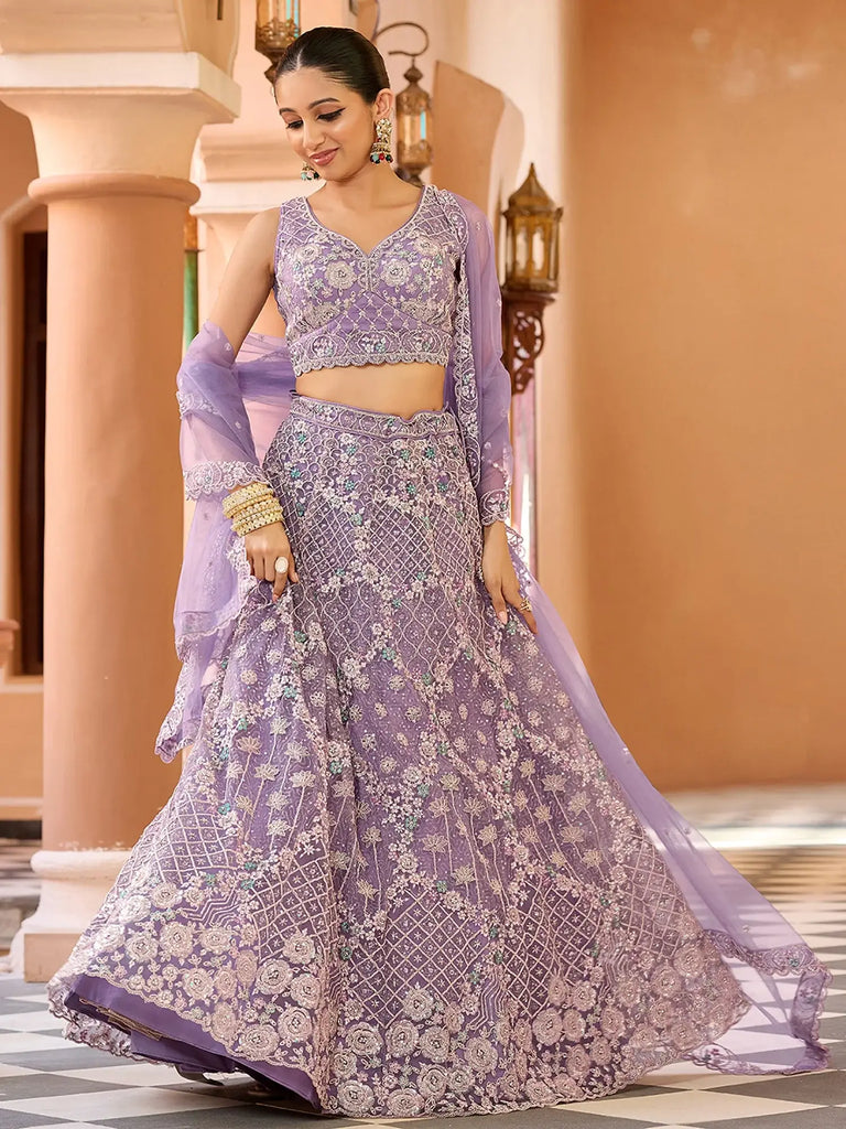 Alluring Purple Sequins Embroidered Net Reception Wear Lehenga Choli