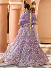 Alluring Purple Sequins Embroidered Net Reception Wear Lehenga Choli