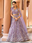 Alluring Purple Sequins Embroidered Net Reception Wear Lehenga Choli