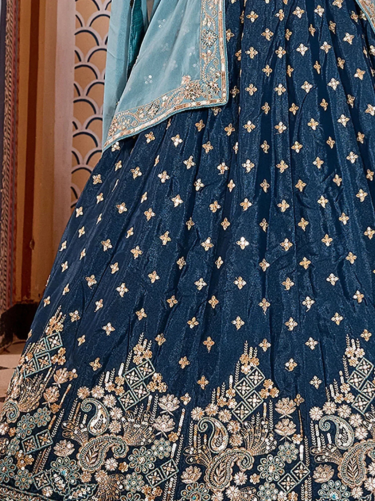 Elegant navy blue lehenga with gold floral embroidery and matching dupatta for Indian ethnic wear