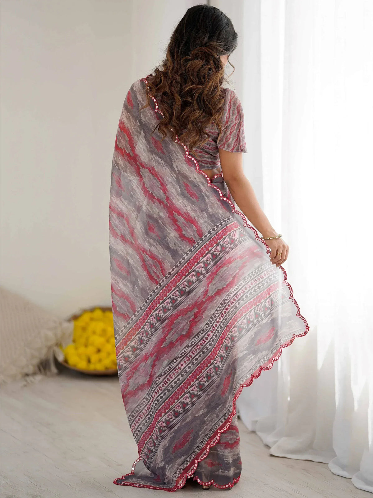 Elegant ethnic saree with red and gray geometric patterns, perfect for Indian wear