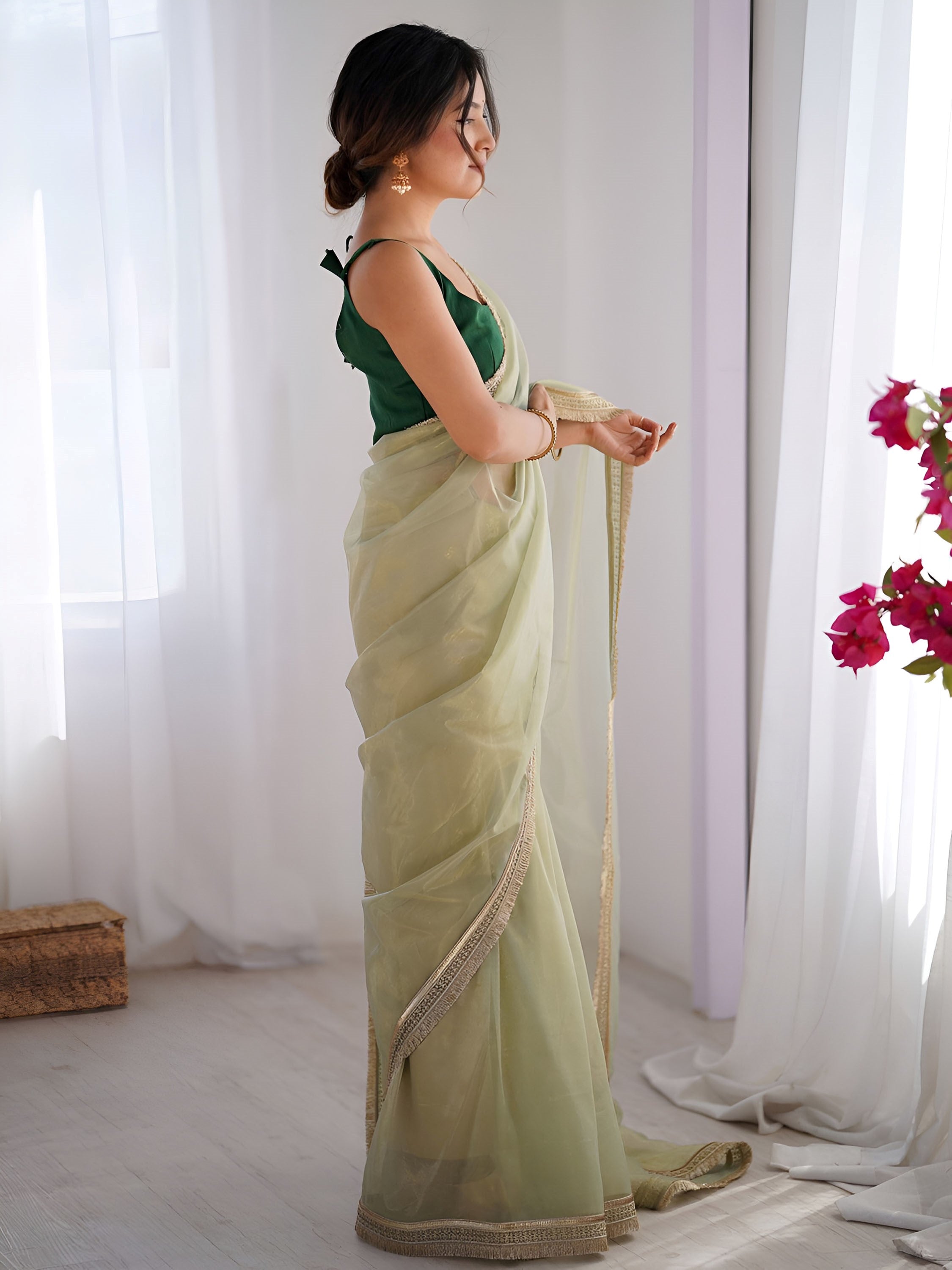 Charming Pista Green Net Engagement Wear Saree With Blouse