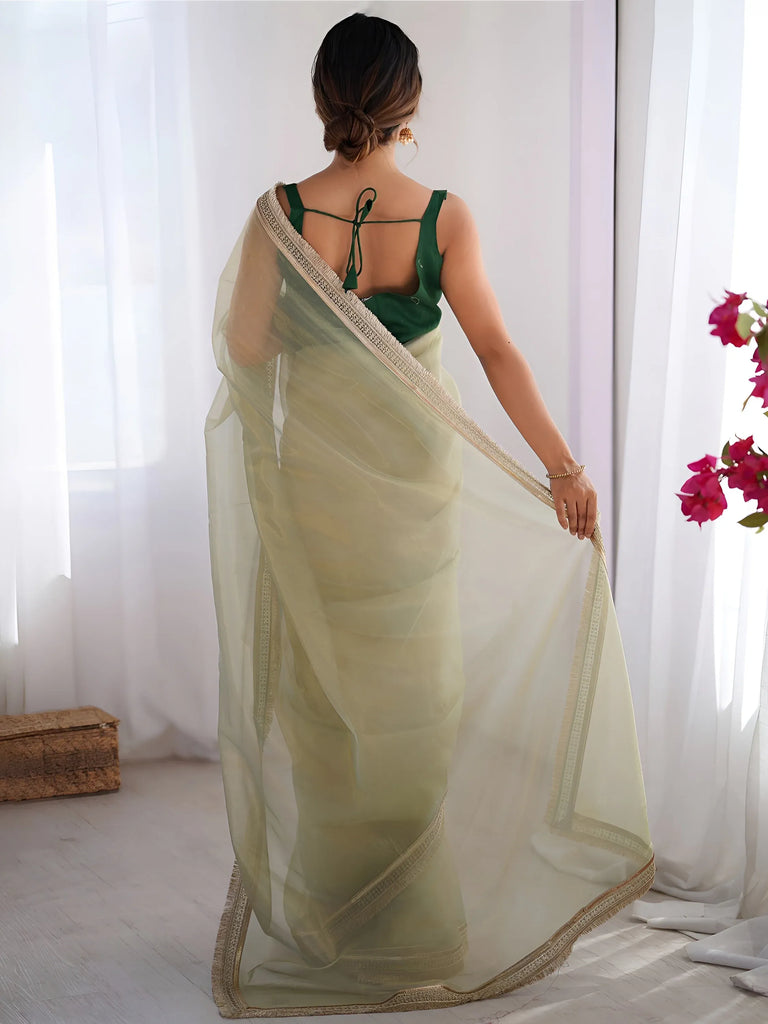 Charming Pista Green Net Engagement Wear Saree With Blouse
