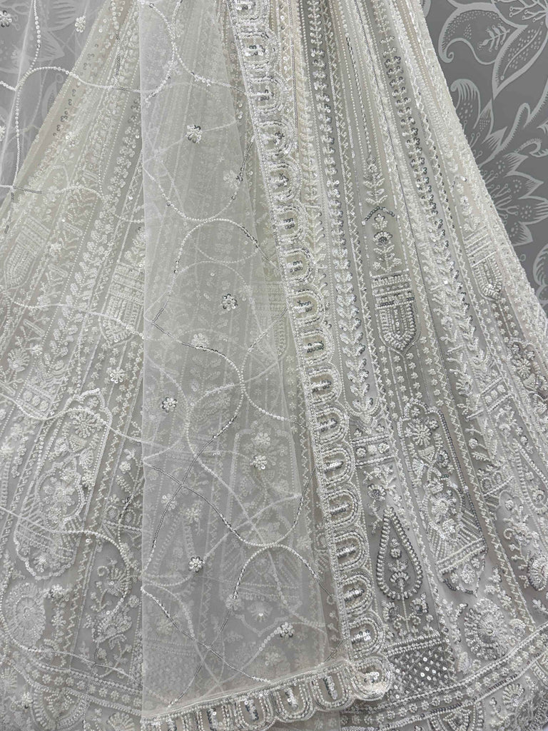 Gleaming White Sequins Net Engagement Wear Lehenga Choli With Dupatta