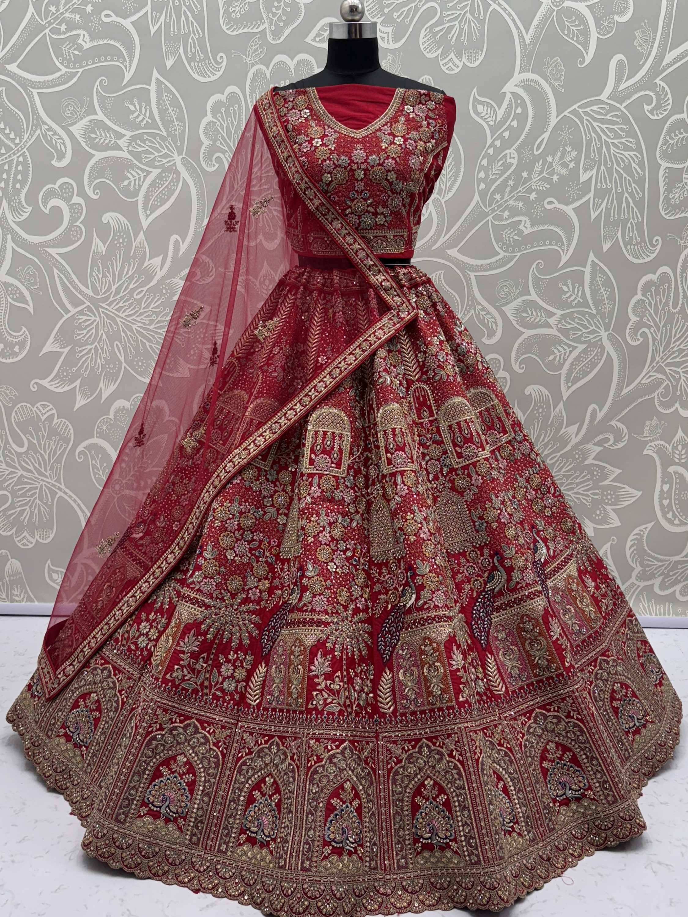 Red embroidered lehenga choli with peacock motifs and sheer dupatta, Indian ethnic wear