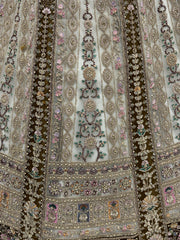 Dazzling Off-White Sequins Net Wedding Wear Lehenga Choli With Dupatta