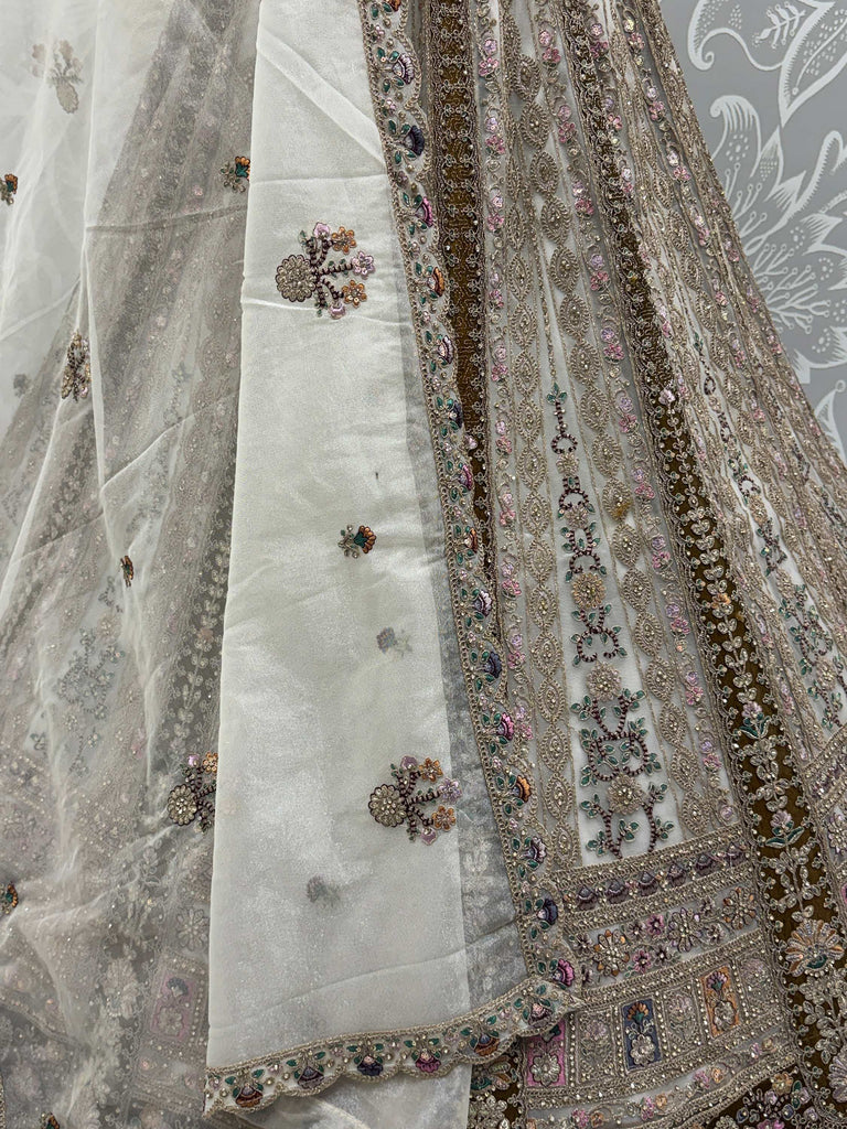 Dazzling Off-White Sequins Net Wedding Wear Lehenga Choli With Dupatta