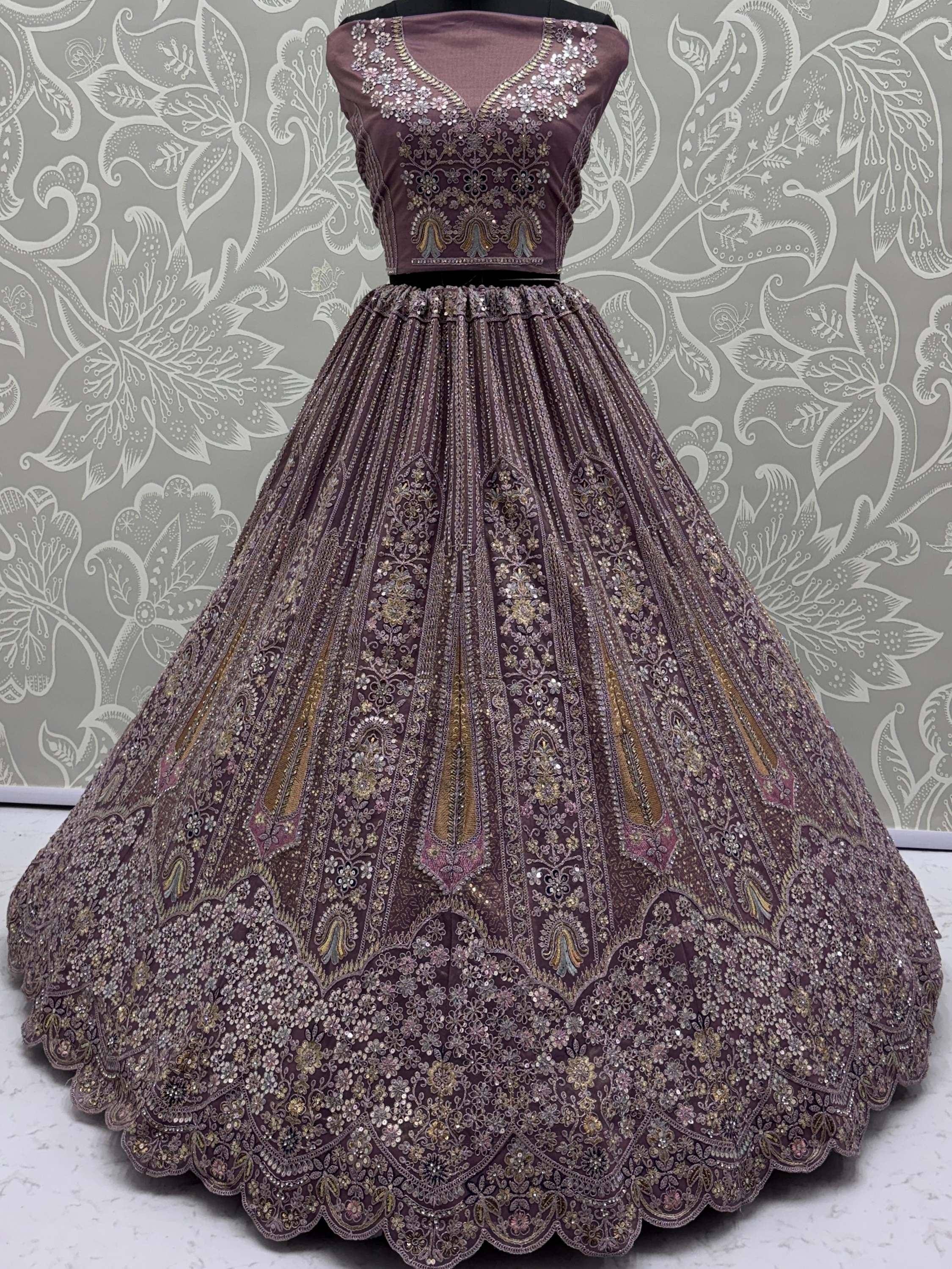 Elegant purple designer lehenga choli with heavy floral embroidery and sequin work for weddings