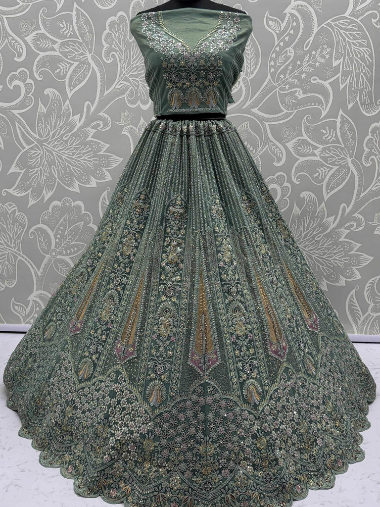 Tantalizing Green Sequins Net Engagement Wear Lehenga Choli With Dupatta