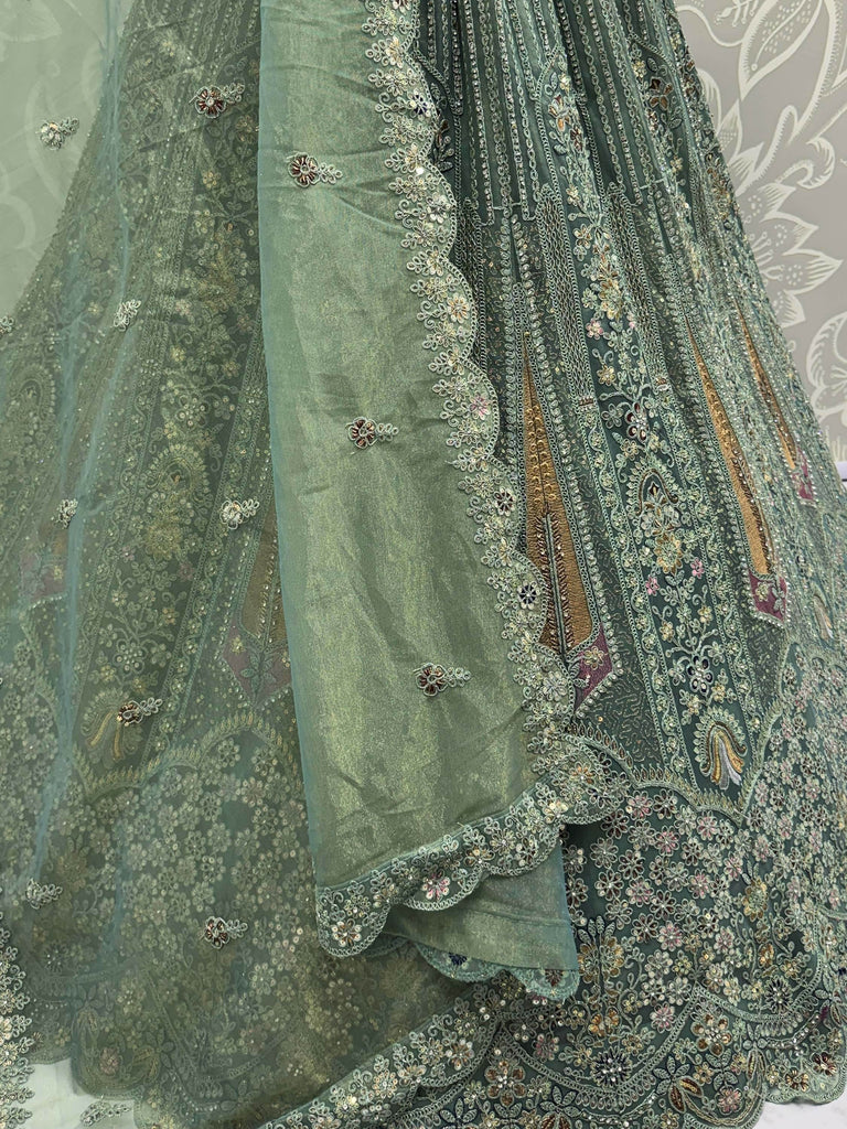 Tantalizing Green Sequins Net Engagement Wear Lehenga Choli With Dupatta