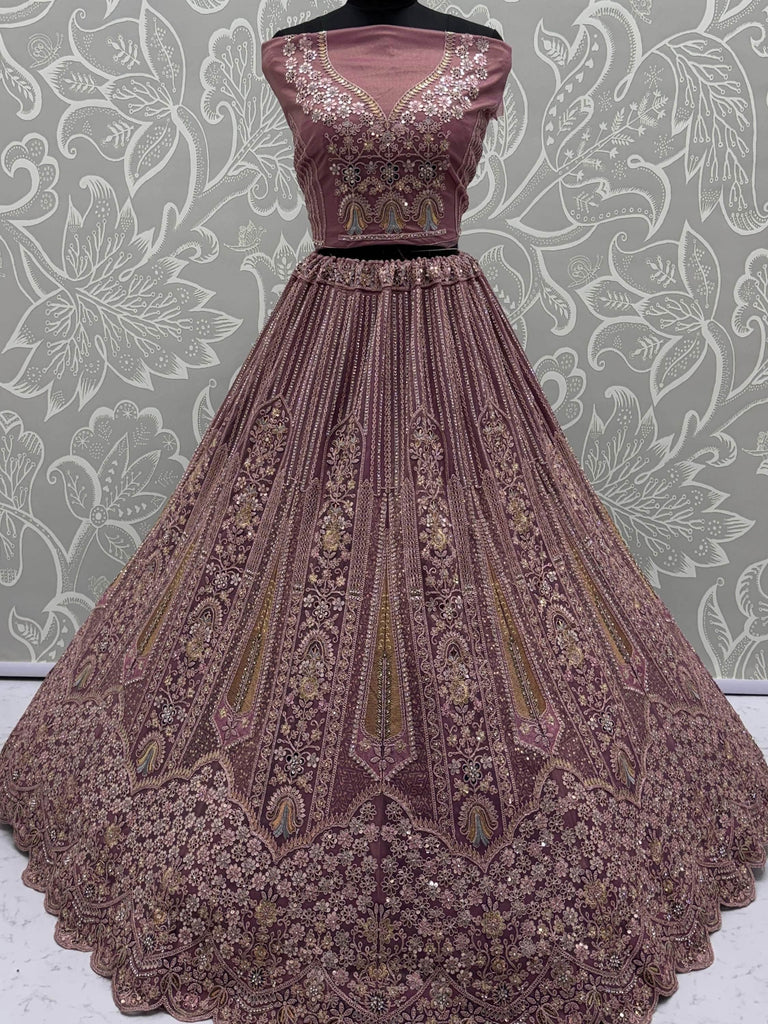Fabulous Mauve Dori Work Net Reception Wear Lehenga Choli With Dupatta