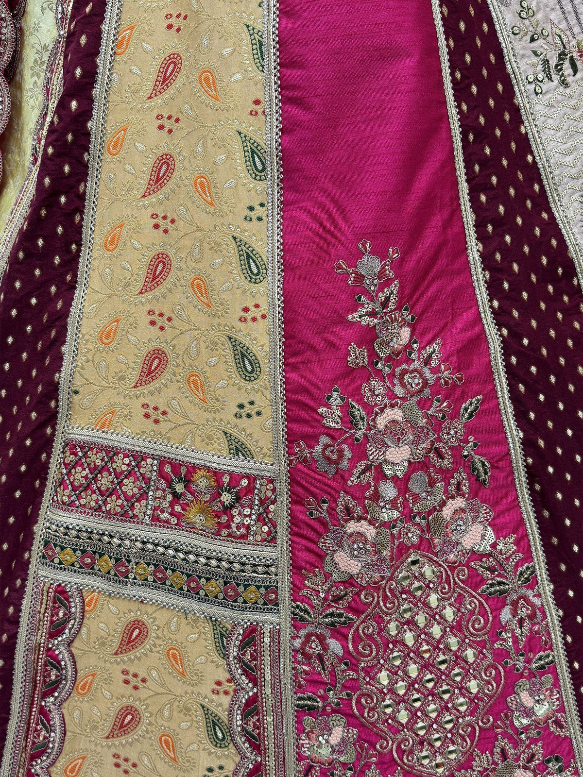 Luxury Indian ethnic wear with intricate paisley and floral embroidery, sequins, and mirror work on rich fabrics.