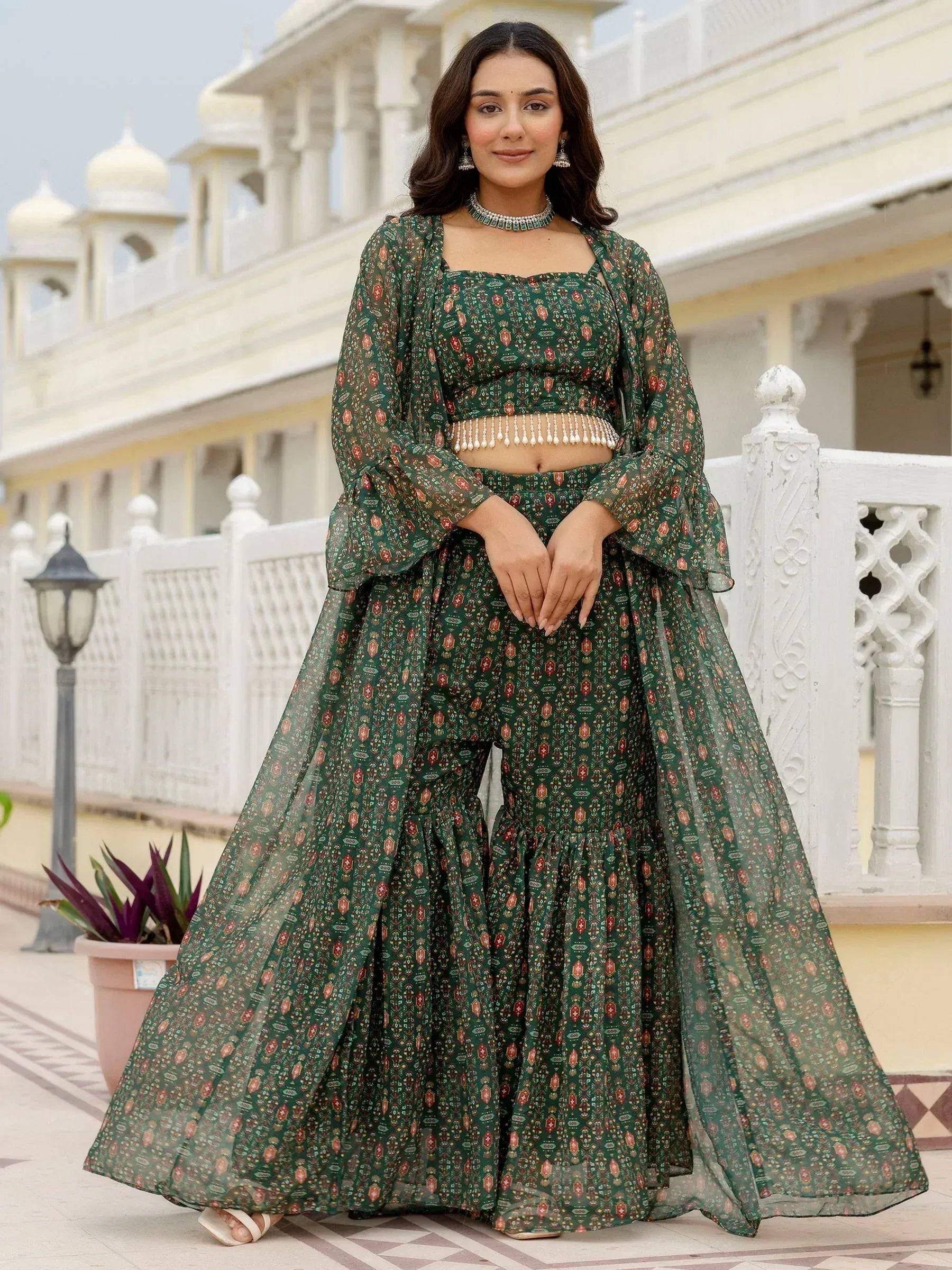 Green printed lehenga choli with flared skirt and sheer dupatta, perfect for Indian ethnic wear occasions