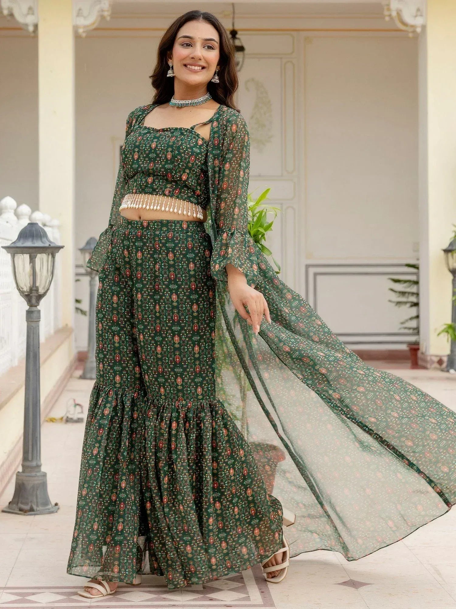 Green printed ethnic palazzo set with sheer cape, perfect for festive occasions and Indian wear
