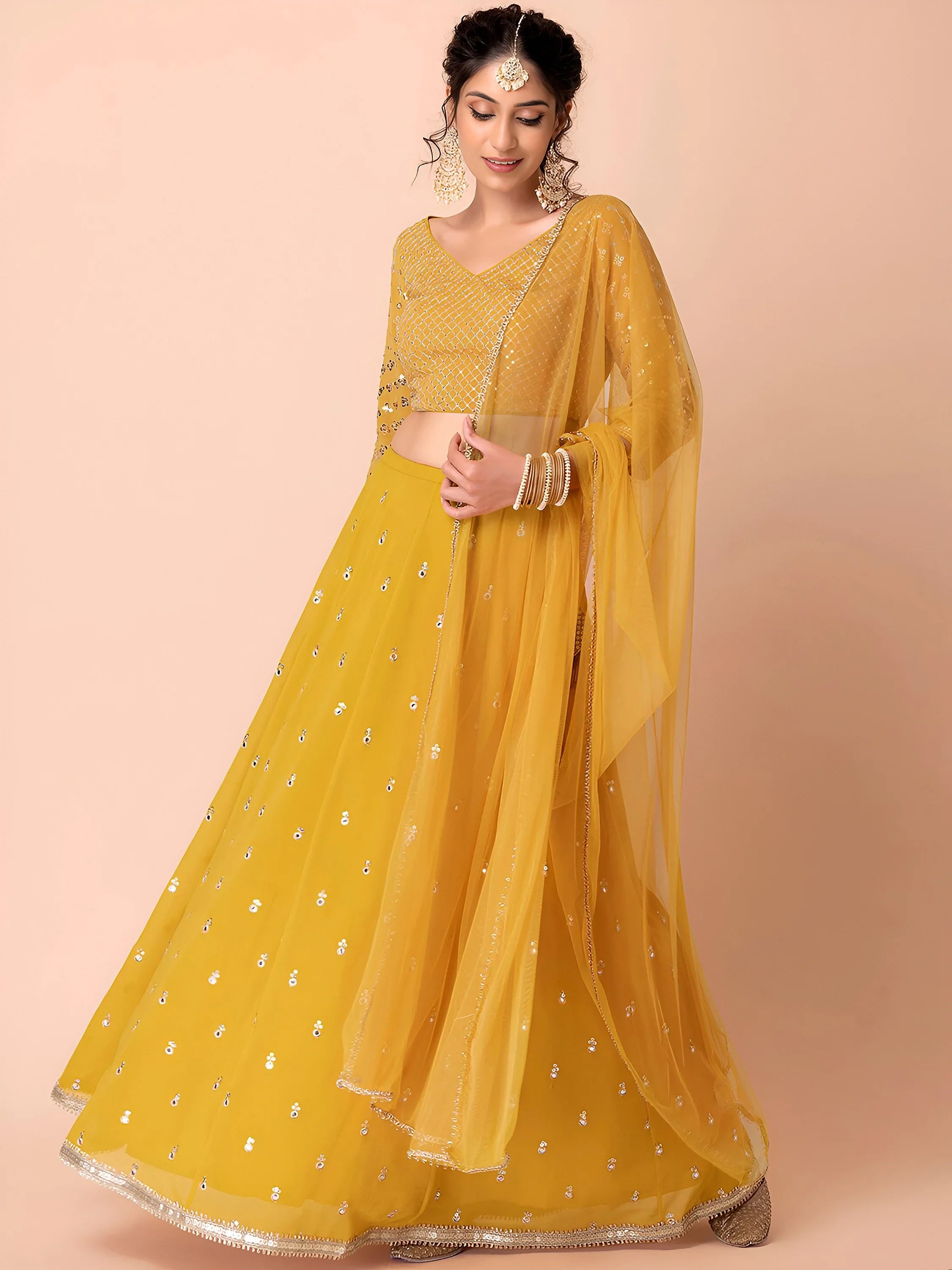 Attractive Yellow Sequins Georgette Haldi Wear Lehenga Choli