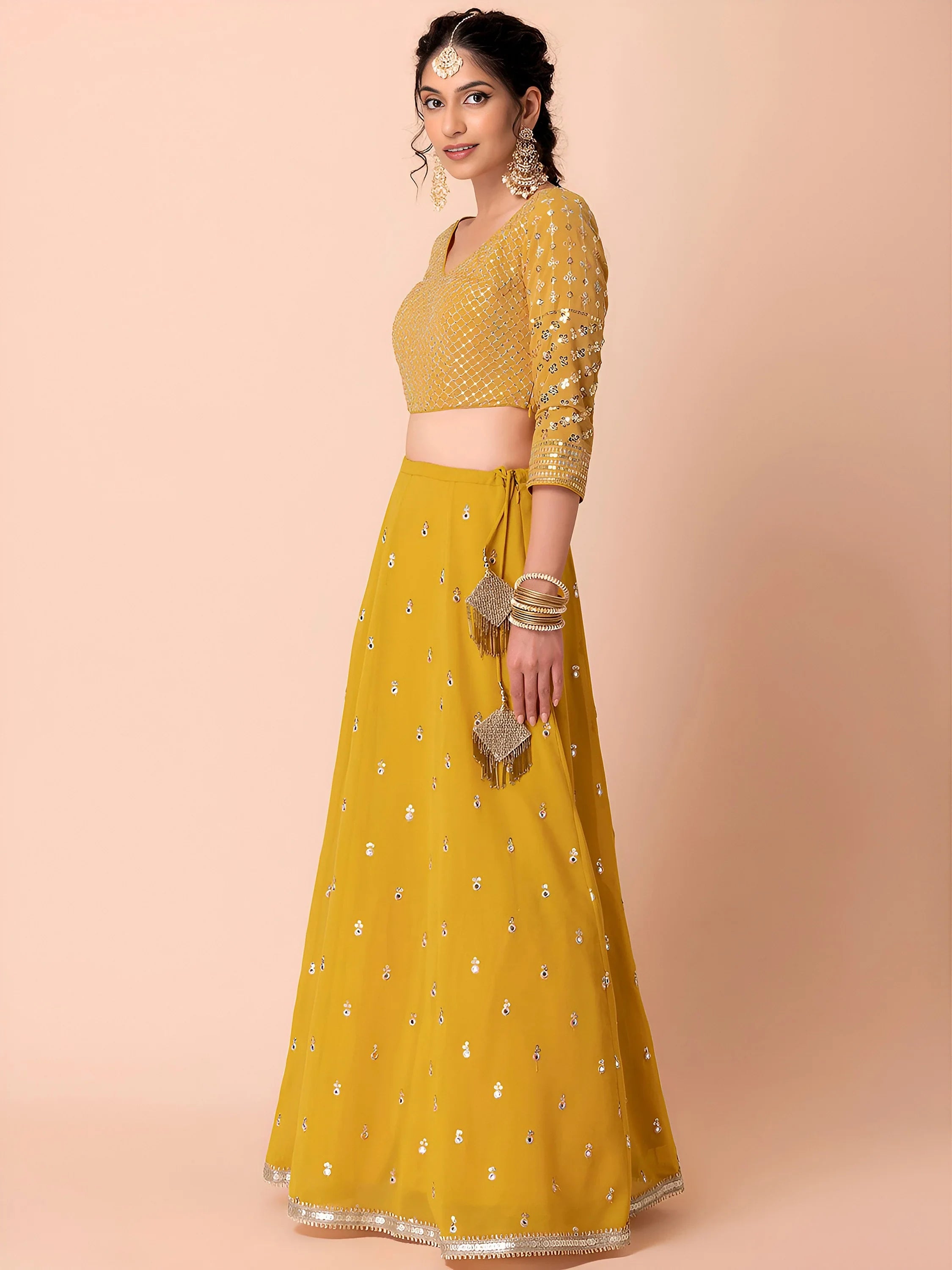 Attractive Yellow Sequins Georgette Haldi Wear Lehenga Choli