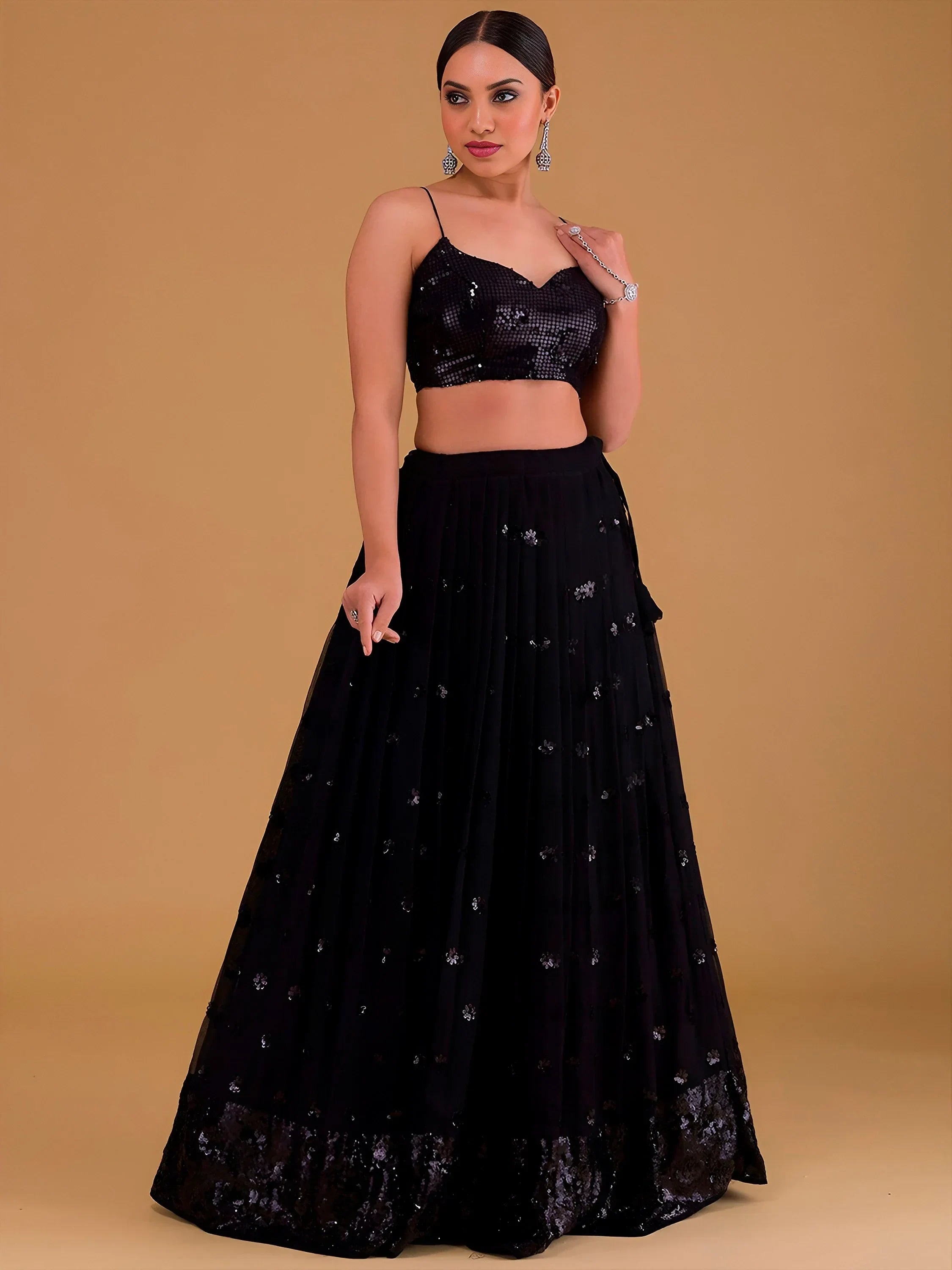 Outstanding Black Sequins Georgette Party Wear Lehenga Choli
