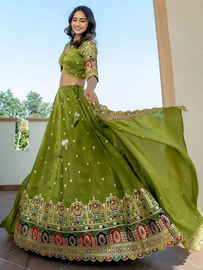 Dazzling Green Thread Embroidered Silk Mehendi Wear Lehenga Choli