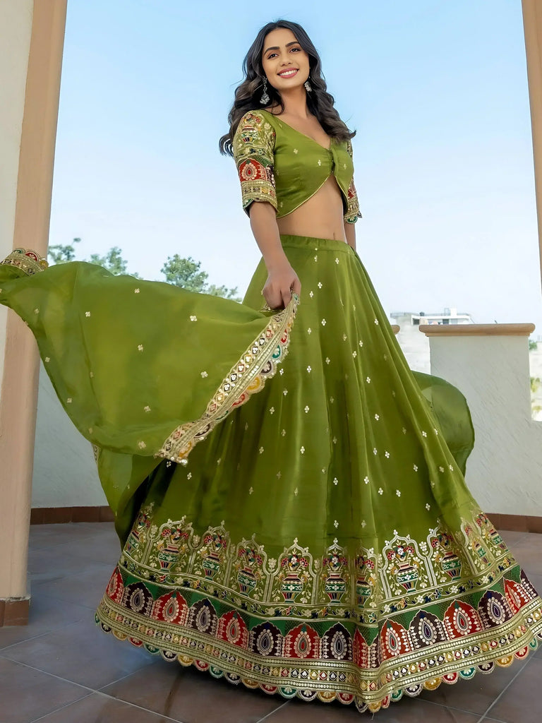 Dazzling Green Thread Embroidered Silk Mehendi Wear Lehenga Choli