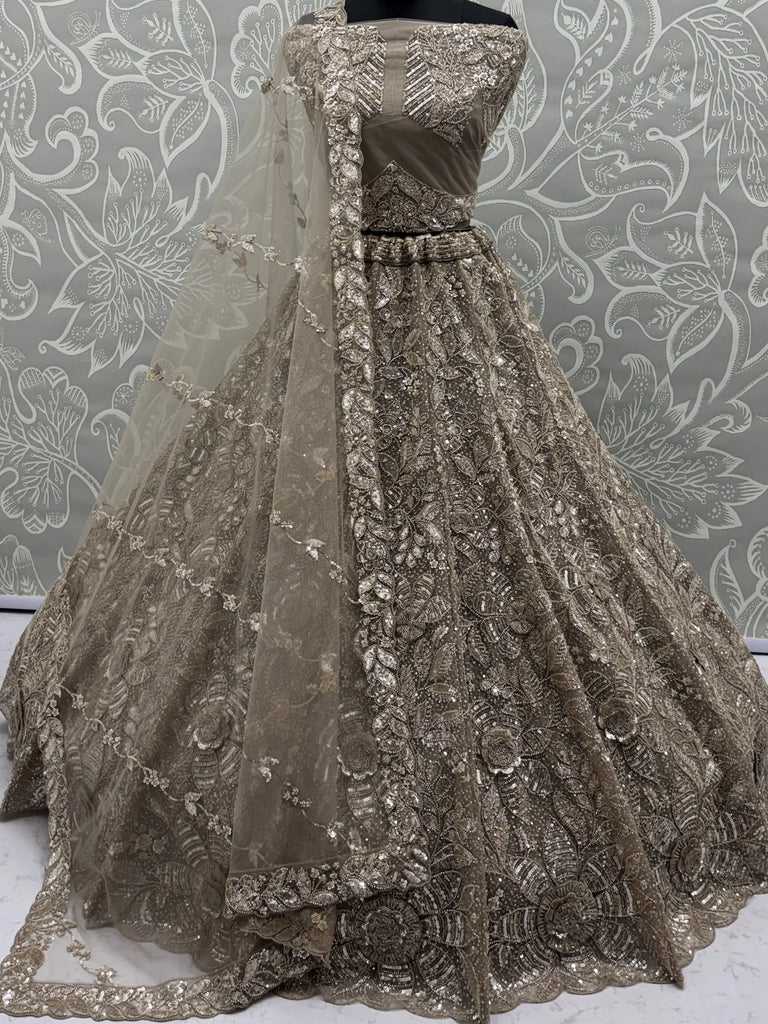 Attractive Beige Beads Work Net Reception Wear Lehenga Choli